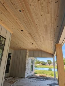 Custom porch ceiling installation in Lafayette, LA by WTH Construction.
